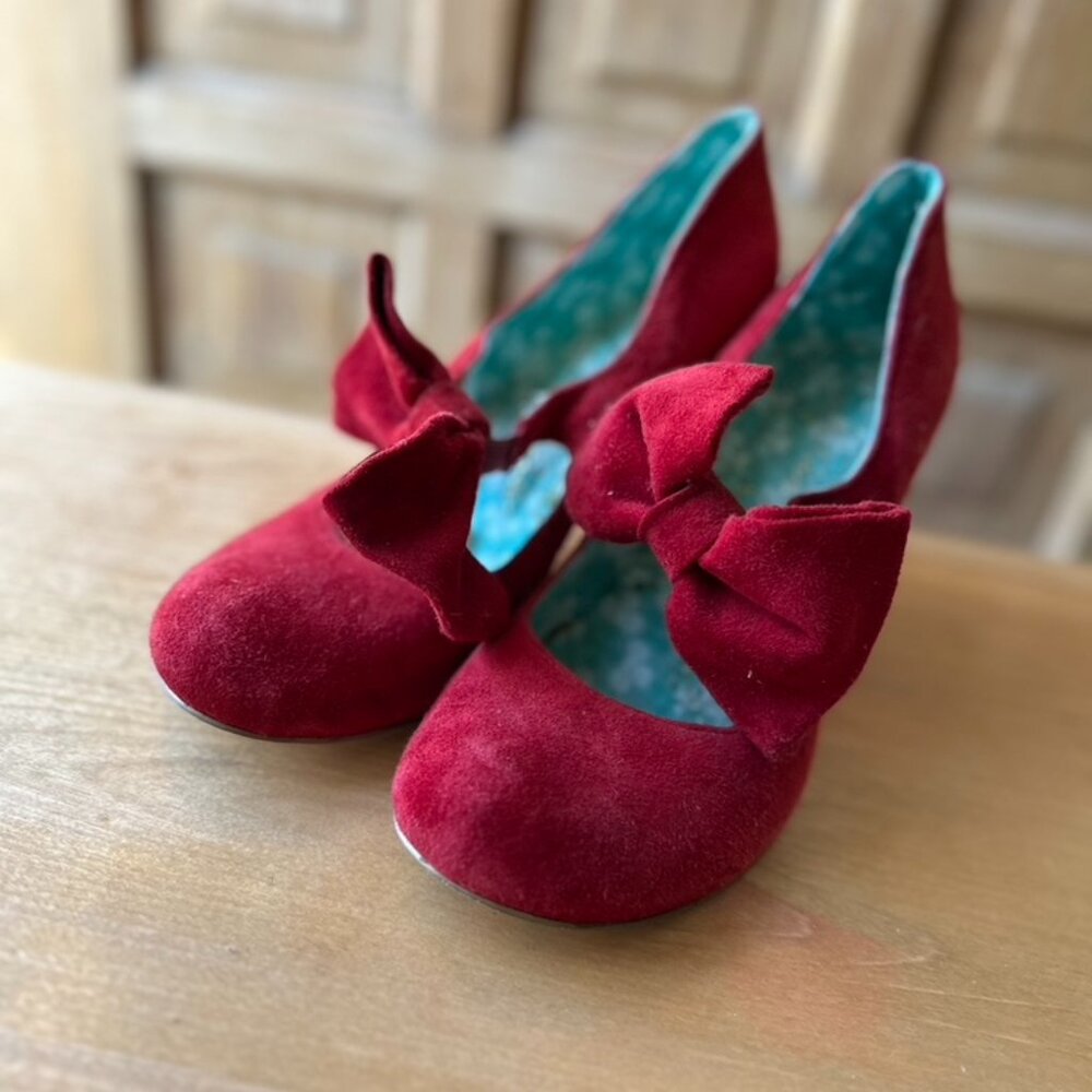 Red Anthropologie bowtie heels - size 7.5
